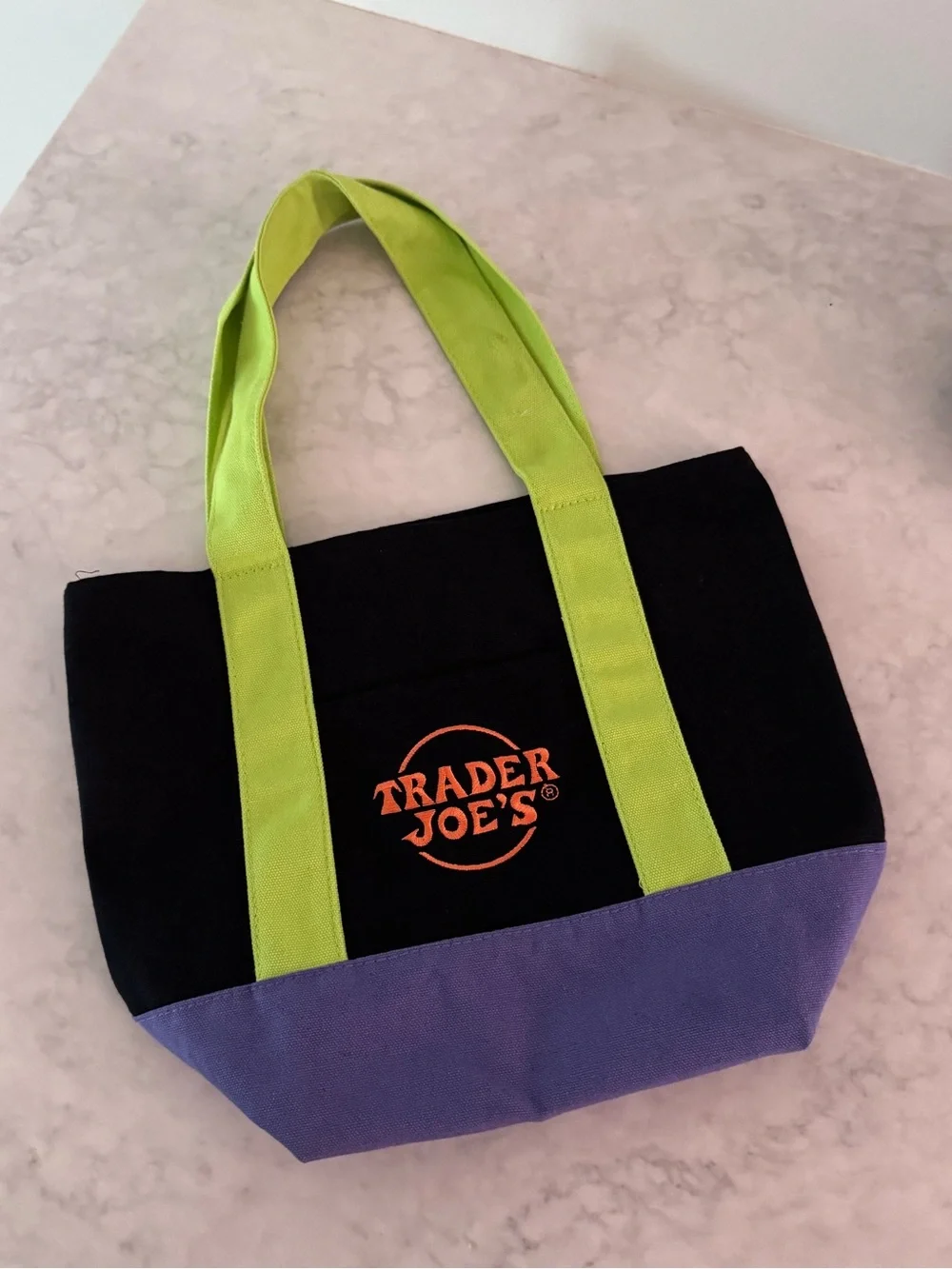 Trader Joe's Black Tote with Lime Handles and Purple Base viral tote